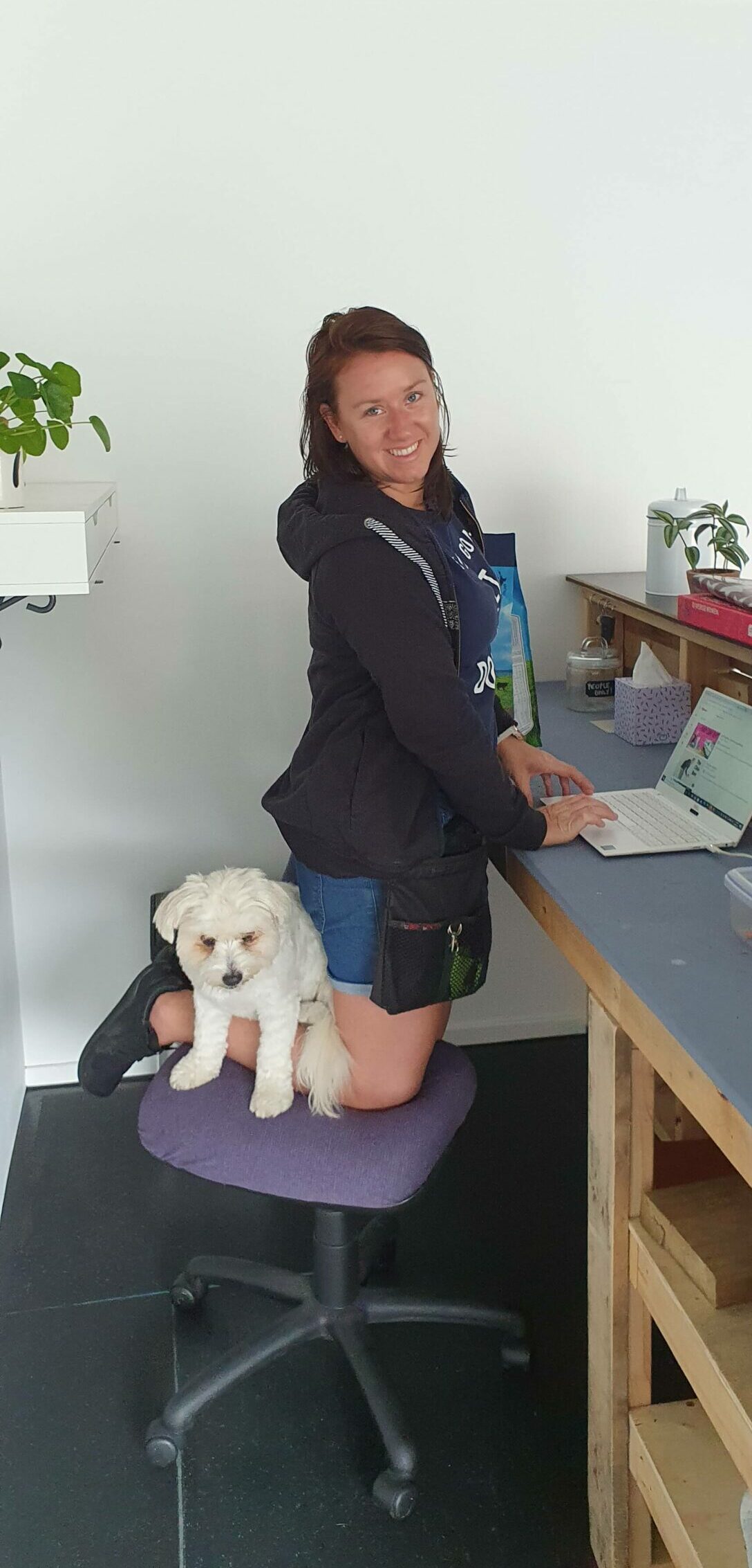 Human and dog on reception chair